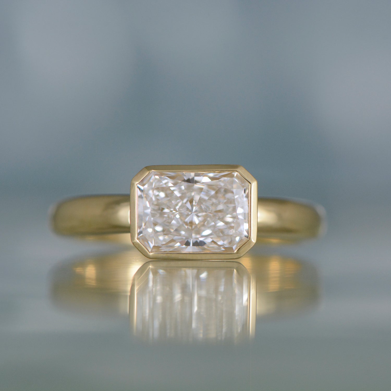AsscherDiamondBezelSolitaire1.jpg